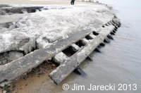 The port edge lies in the water, and is subject to the elements.